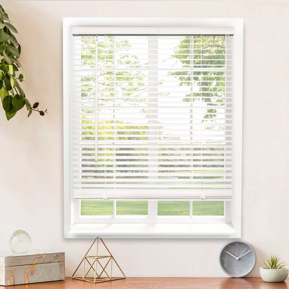 Close-up of white 1-inch vinyl mini blind slats for light filtering control